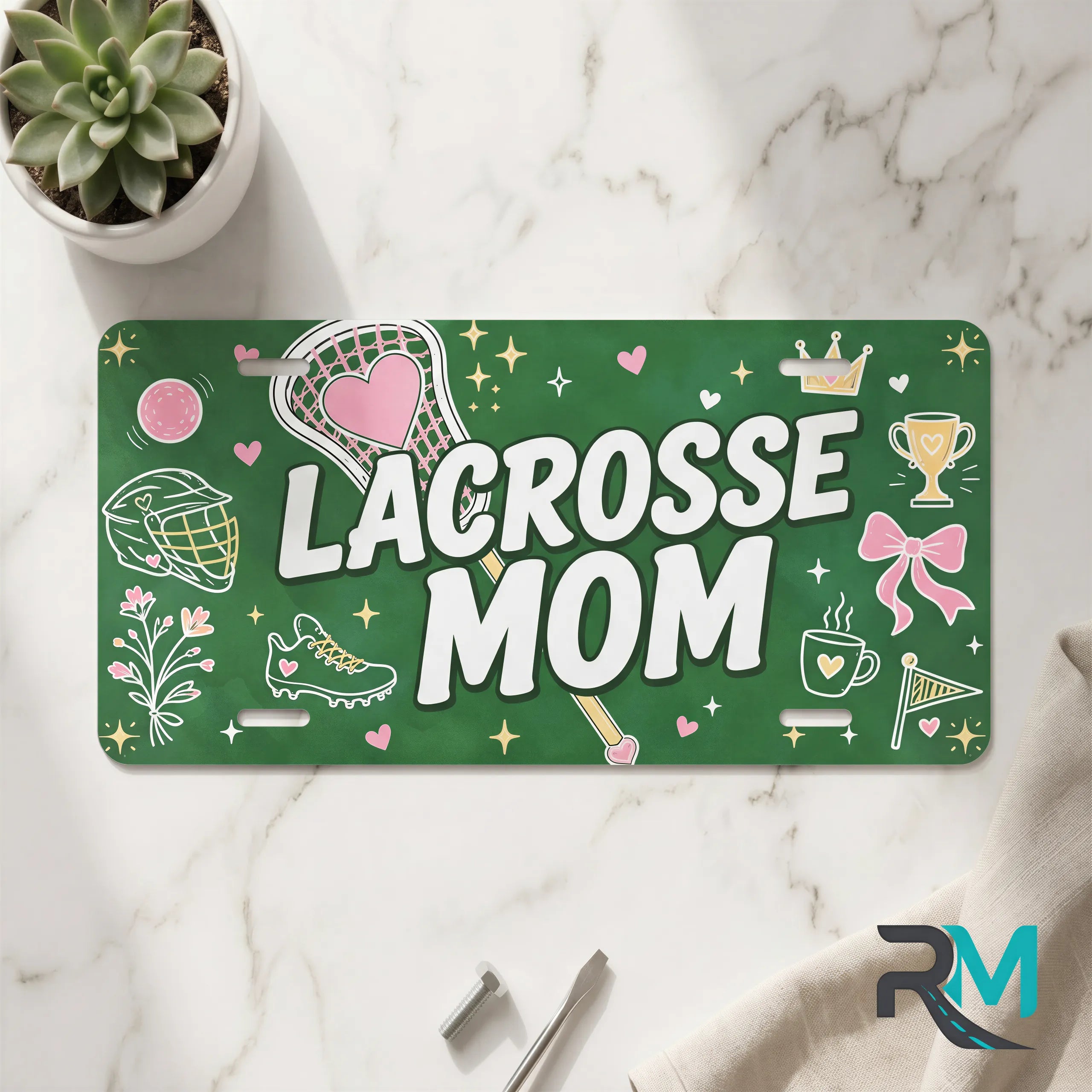 lacrosse mom vanity plate on marble surface — deep green pink lacrosse decorative plate