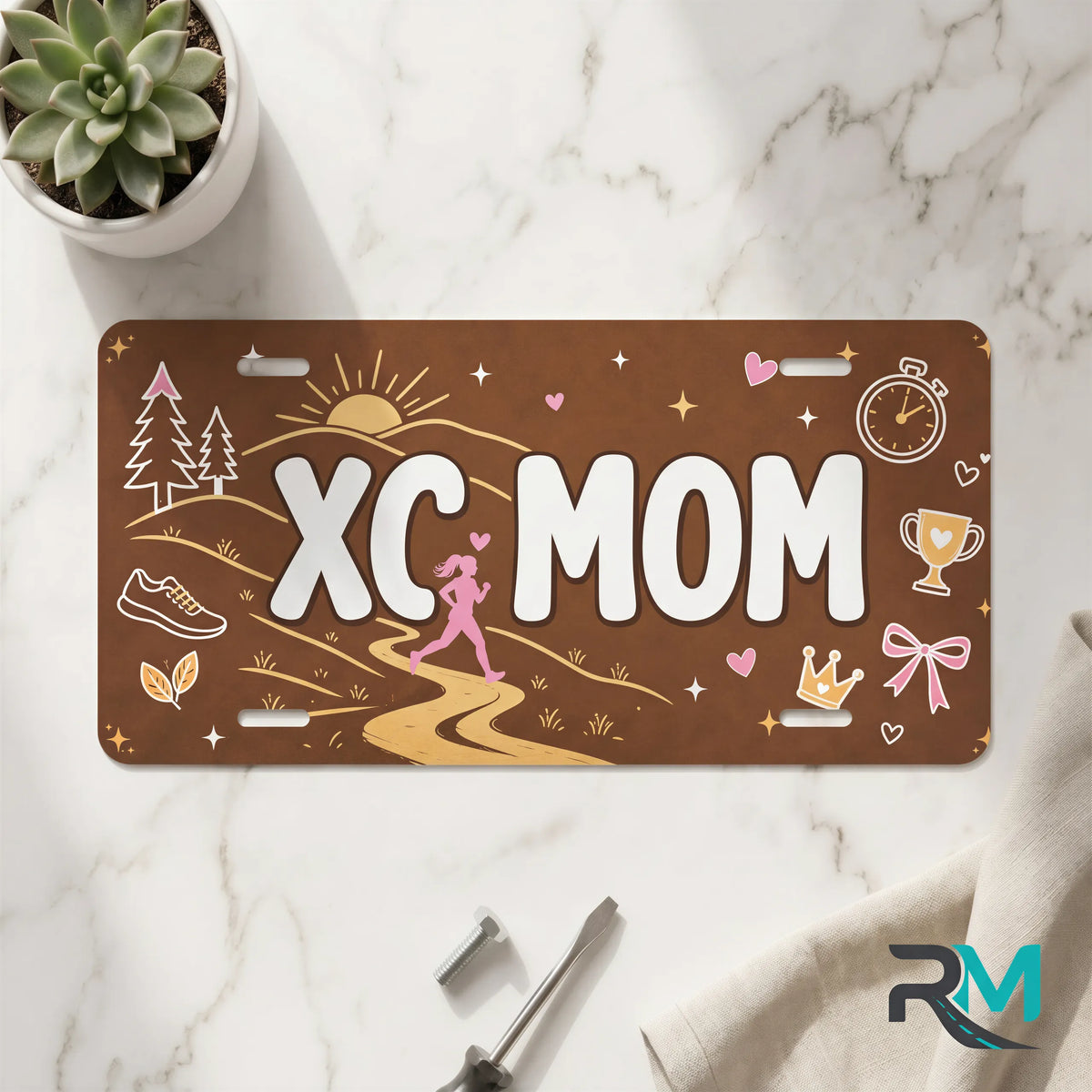 xc mom vanity plate on marble surface — earthy trail runner decorative license plate
