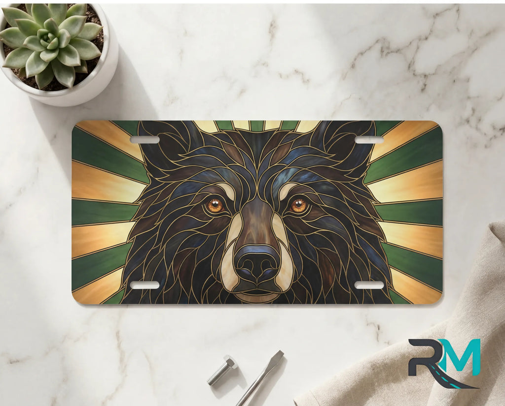 bear face vanity plate on marble surface — deep brown gold forest decorative wildlife plate