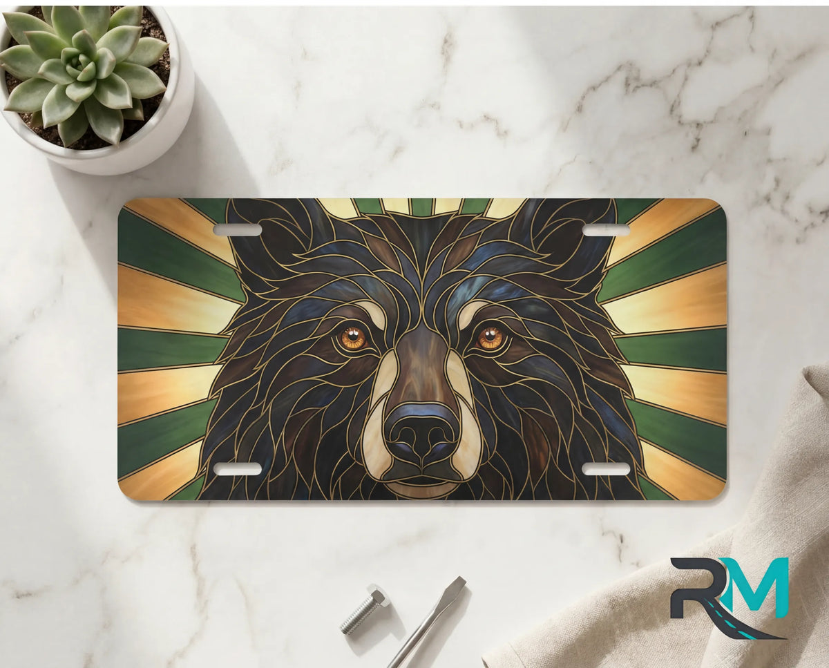 bear face vanity plate on marble surface — deep brown gold forest decorative wildlife plate