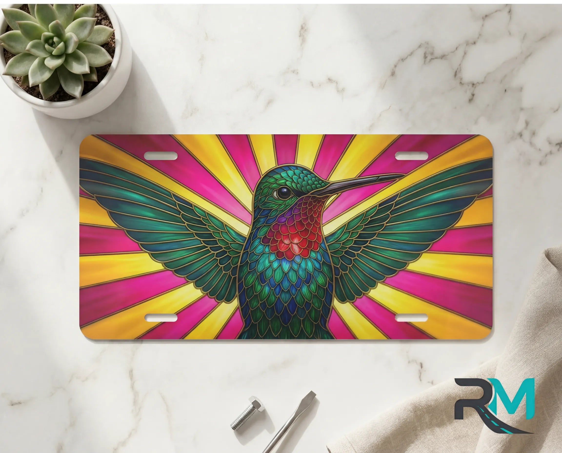 hummingbird vanity plate on marble surface — emerald sapphire radiant bird decorative plate