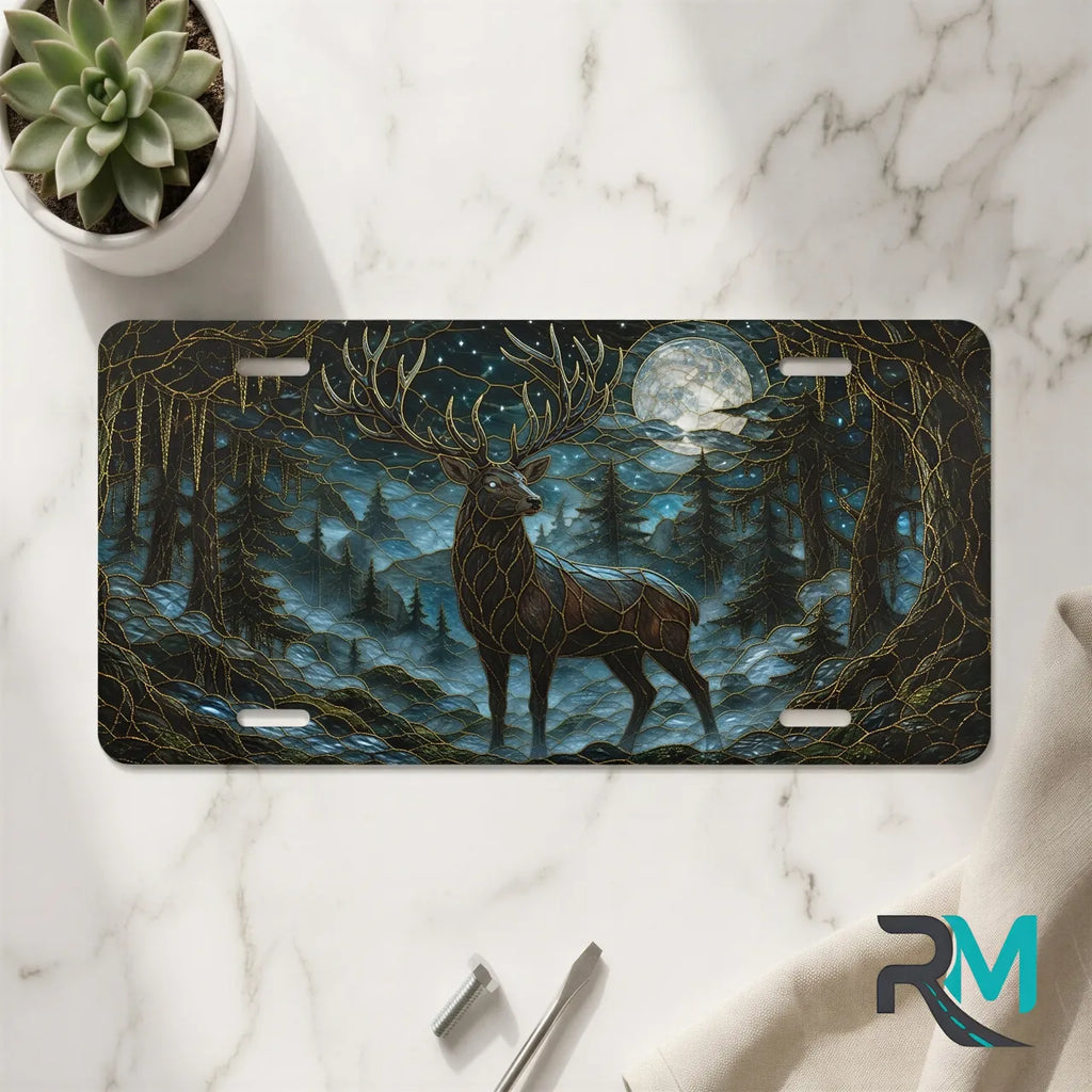moonlit stag vanity plate on marble surface — deep teal ink blue stag pines decorative plate
