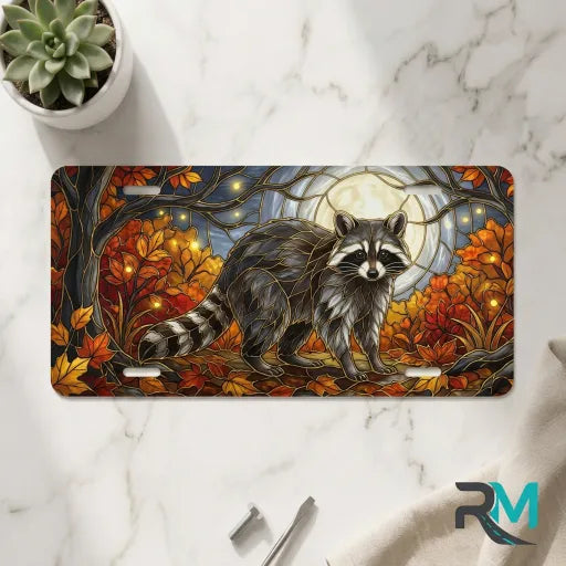 moonlit raccoon vanity plate on marble surface — warm amber rust raccoon decorative plate