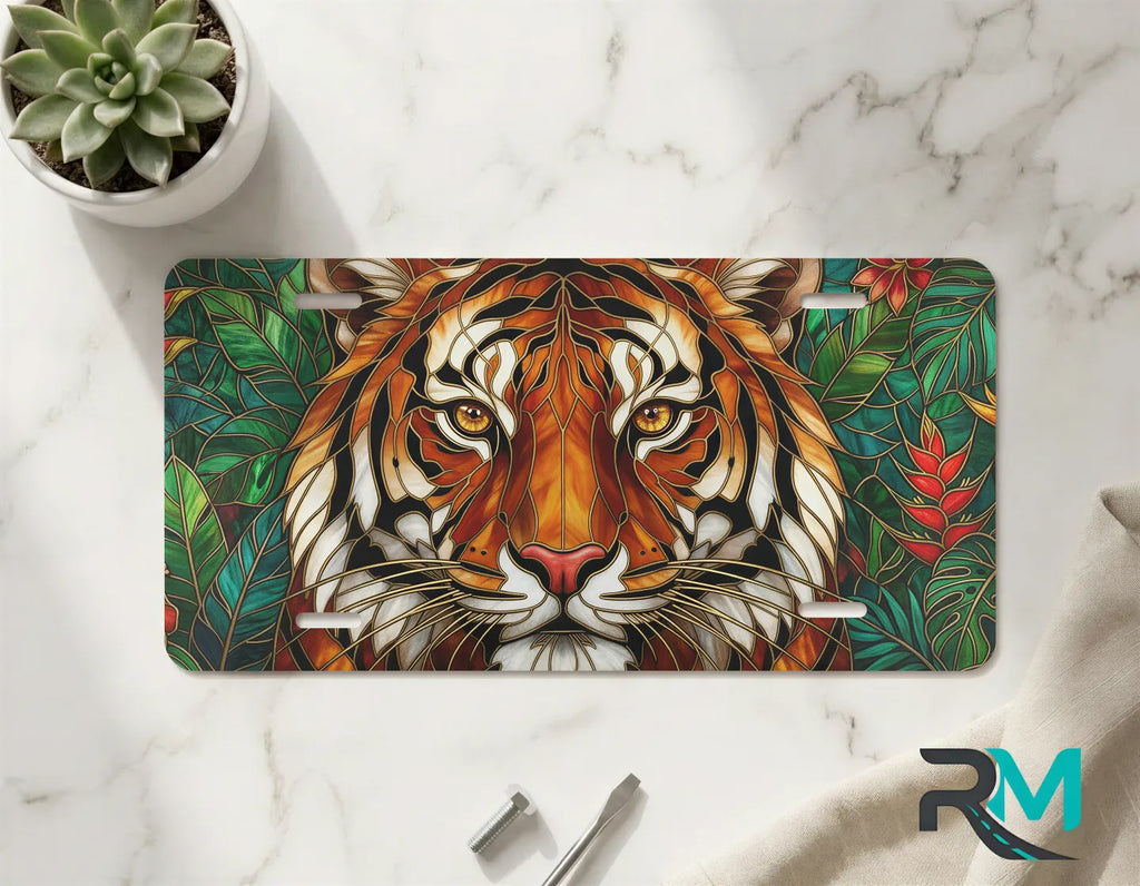 stained glass lion vanity plate on marble surface — warm amber gold decorative lion plate