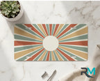vintage rays vanity plate on marble surface — muted rust mustard decorative license plate