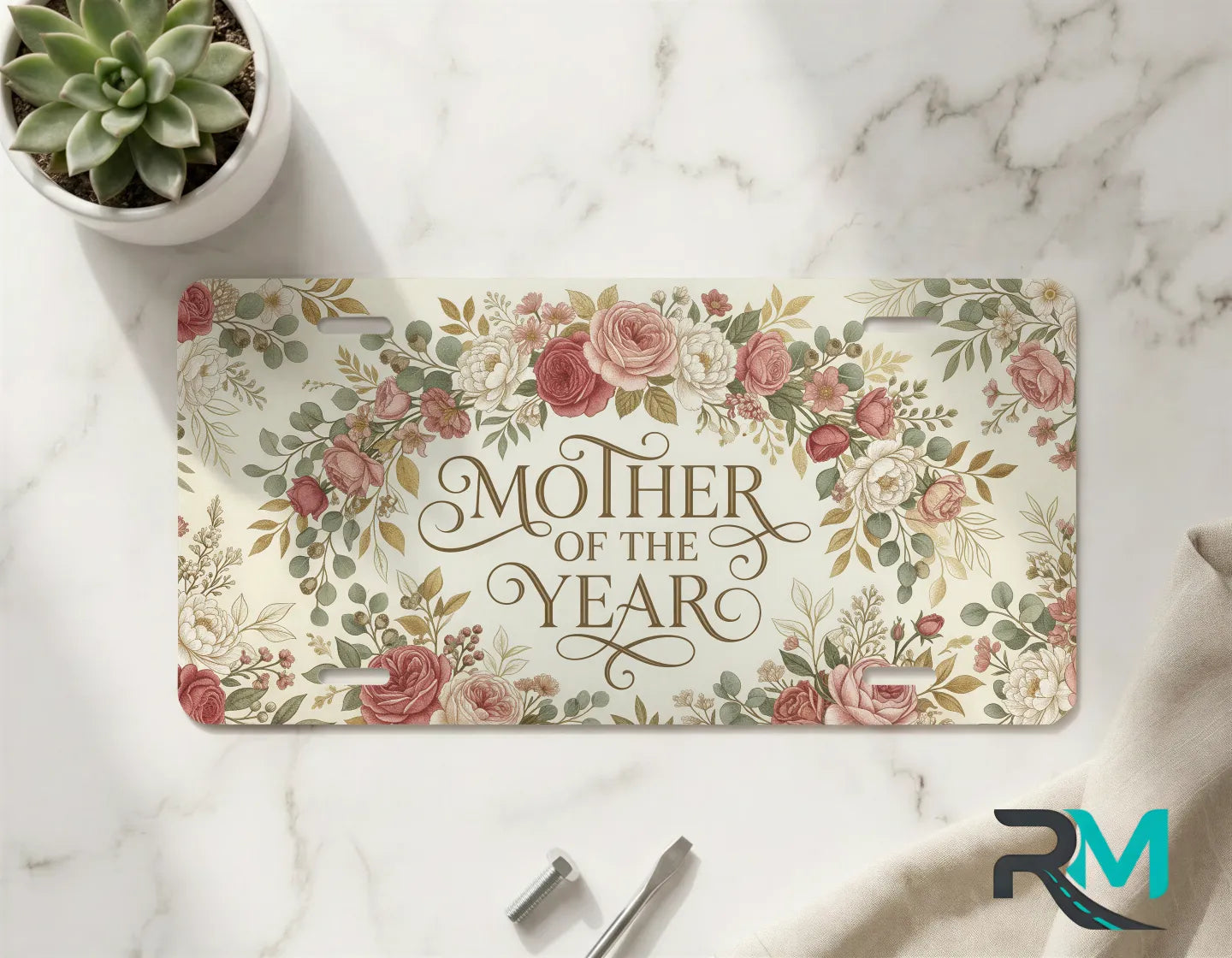 mother of the year vanity plate on marble surface — dusty pink decorative floral plate
