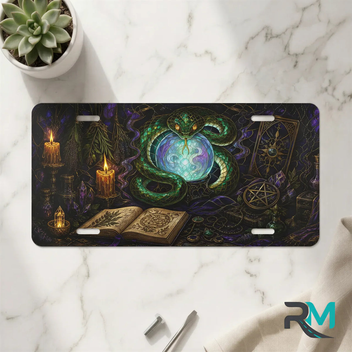 green serpent crystal ball vanity plate on marble surface — jewel green serpent orb decorative plate