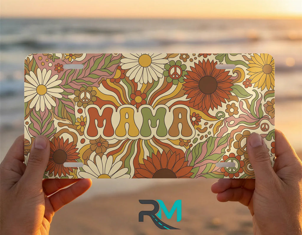 hands holding mama retro floral license plate — warm rust mustard daisy vanity plate art