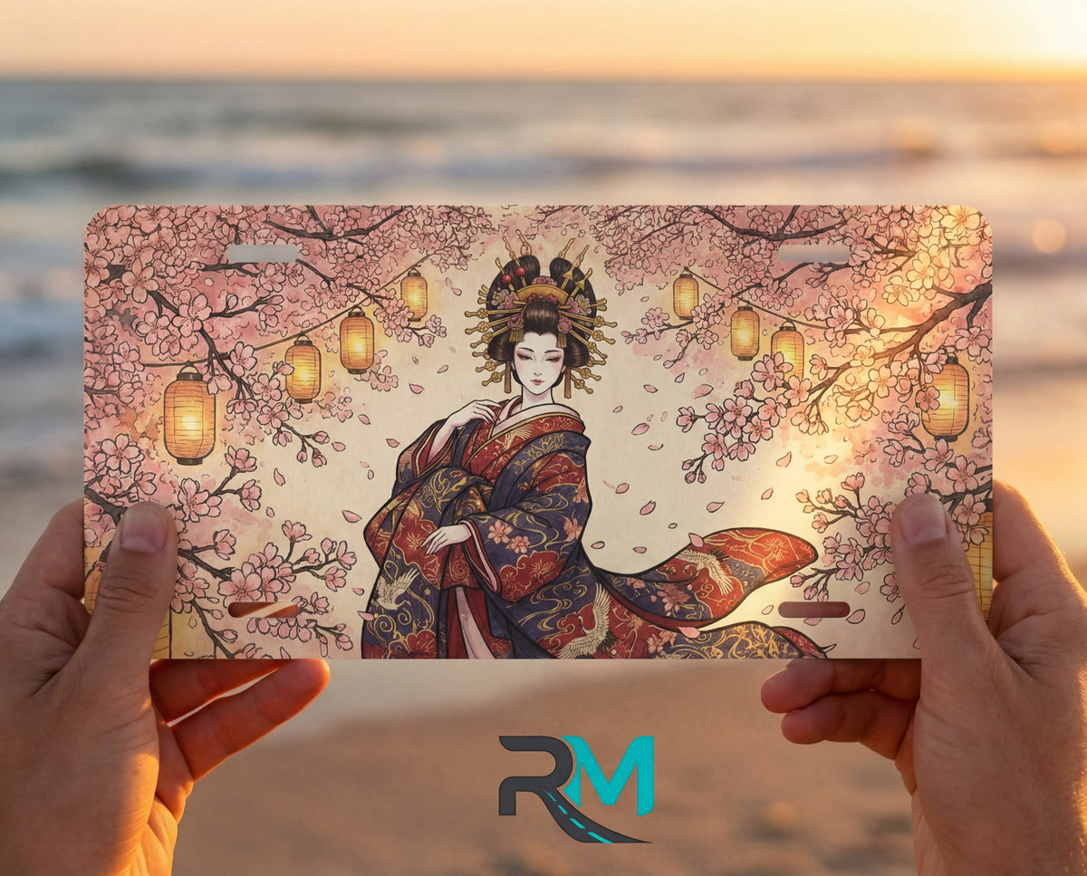 person showing geisha sakura lanterns vanity plate — soft pink kimono cherry blossom lanterns front license plate