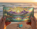 person showing sunrise mountain lake vanity plate — warm gold purple mountain lake front license plate