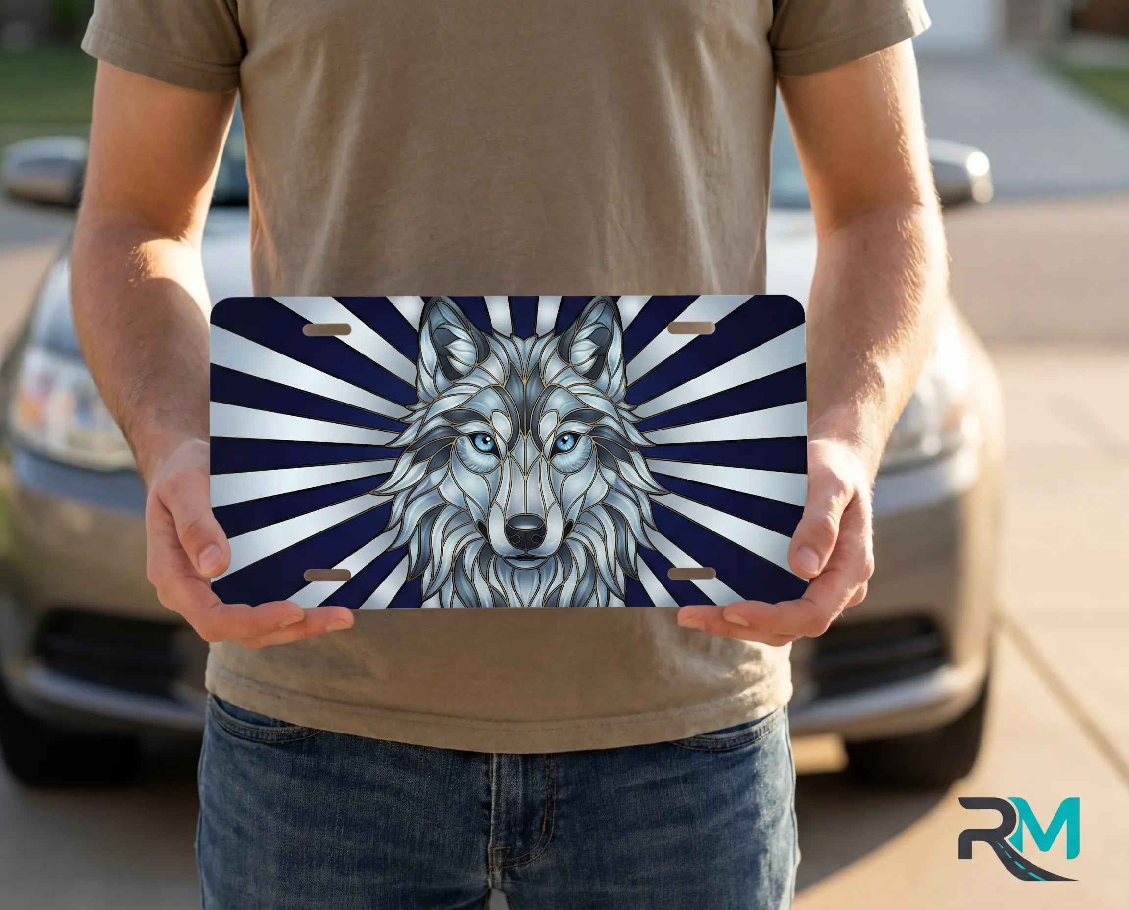 person holding blue wolf license plate — stained glass navy wolf vanity plate art