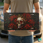 person holding skull crown vanity plate — jewel red crowned skull chrysanthemum front license plate