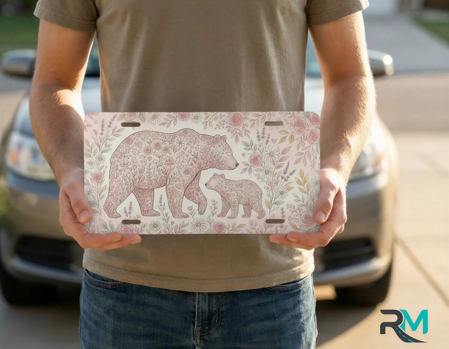 person holding floral bear mom cub license plate — blush rose nursery vanity plate art