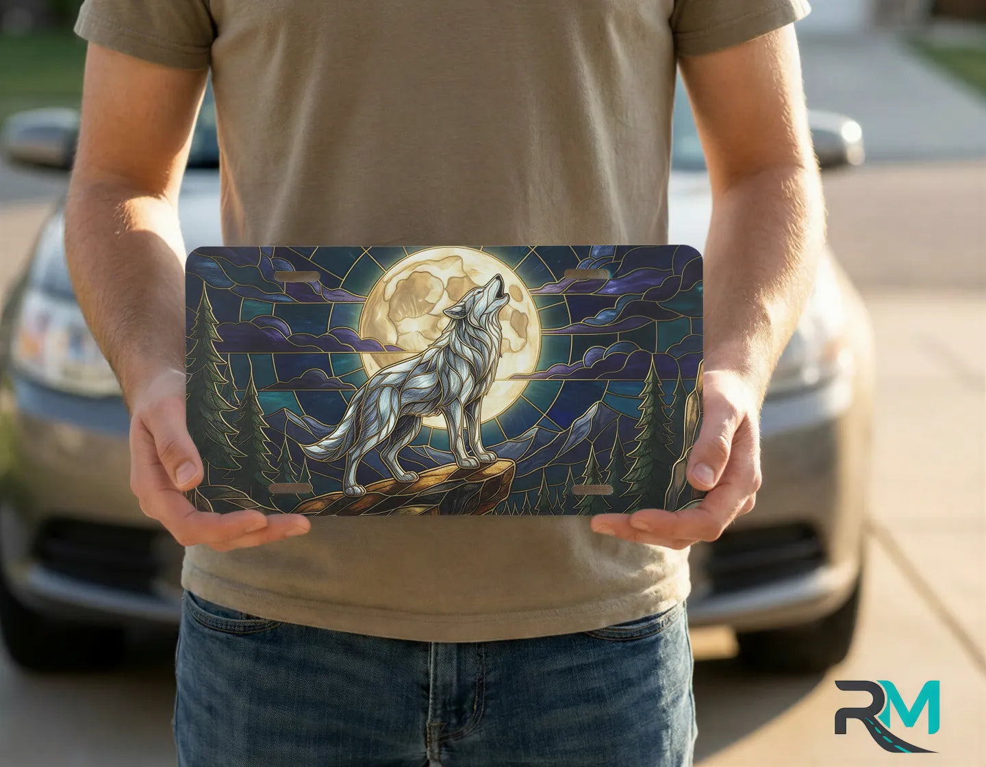 person holding wolf moon license plate — stained glass midnight wolf vanity plate art