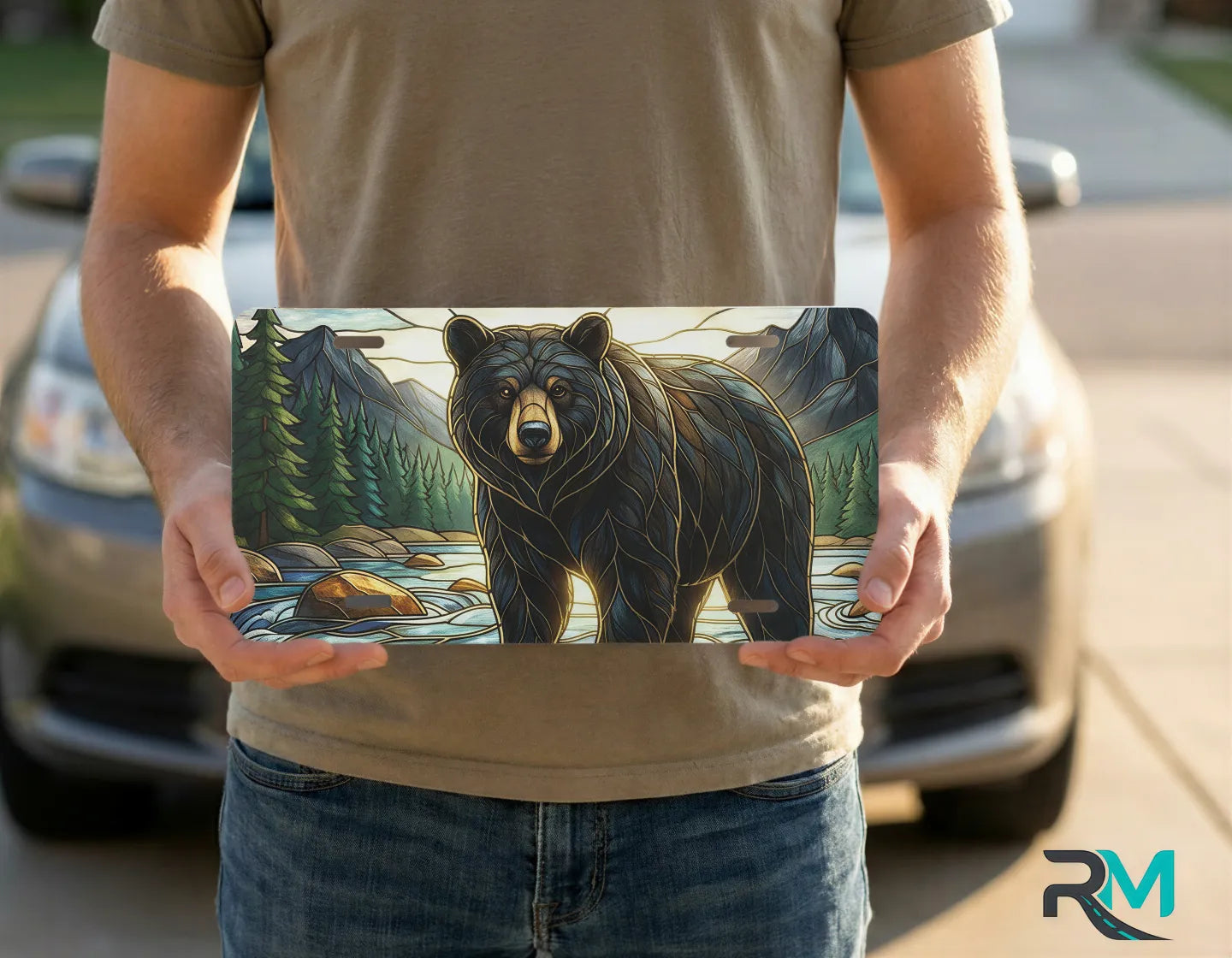 person holding mountain river bear license plate — wildlife bear vanity plate art