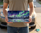 person holding northern lights license plate — aurora landscape vanity plate night sky art