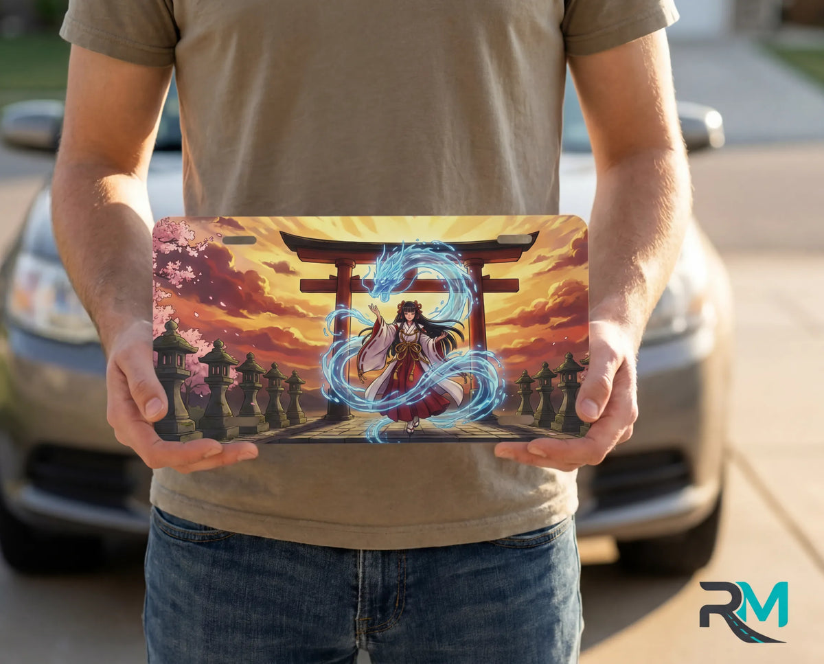 person showing spirit shrine vanity plate — blazing sunset electric blue spirit torii front license plate