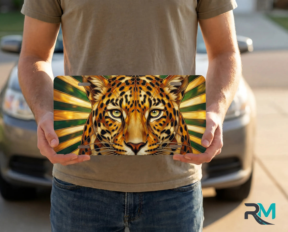 person holding leopard face license plate — stained glass wildcat golden vanity plate art