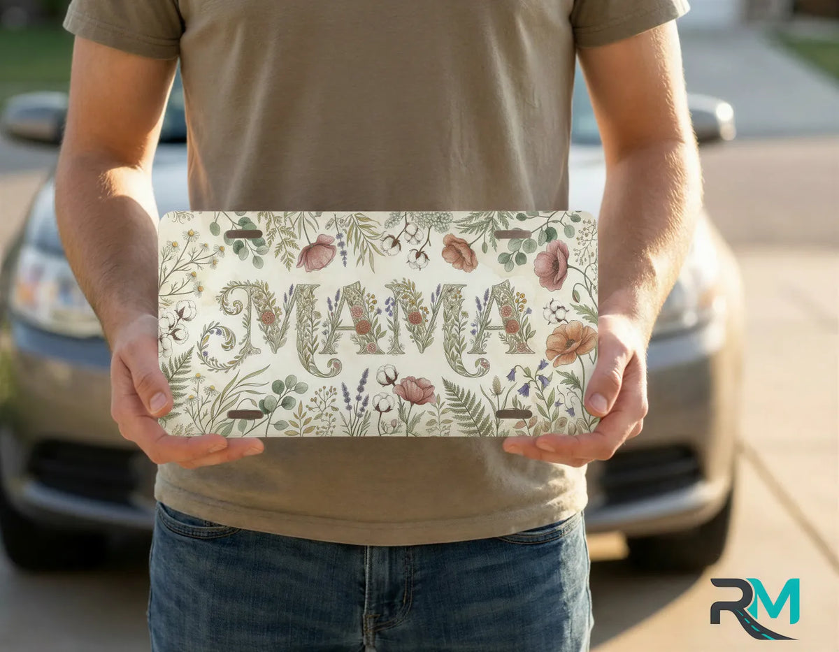 person holding mom life license plate — simple clean custom vanity plate design