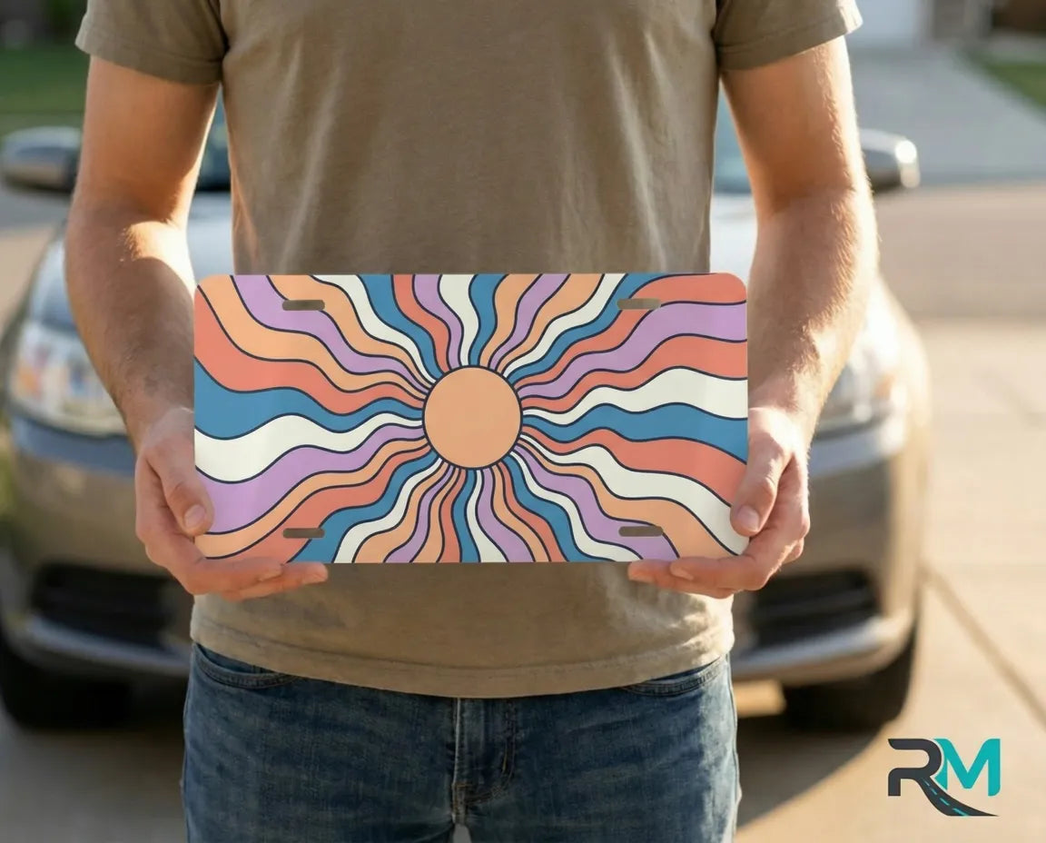person holding retro sunburst license plate — colorful boho vanity plate summer art