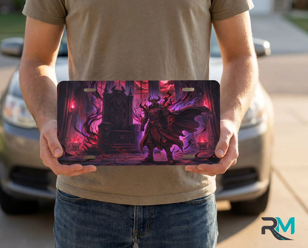 person showing dark demon lord vanity plate — deep crimson violet demon lord pillars front license plate