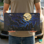person holding full moon bats vanity plate — midnight blue bat silhouette cracked moon front plate