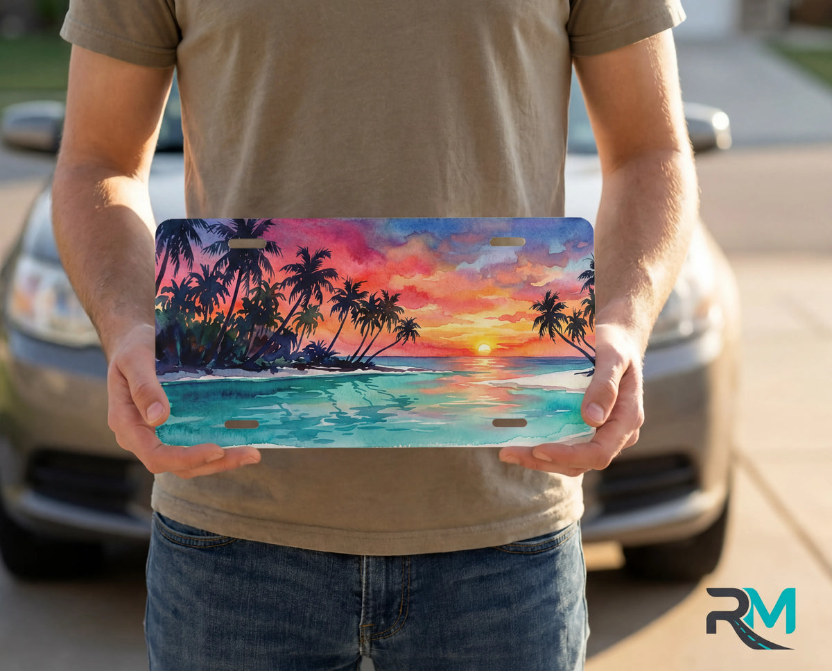 person holding tropical sunset license plate — palm silhouette beach vanity plate watercolor art