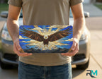 person holding stained glass eagle license plate — cobalt gold soaring eagle vanity plate art