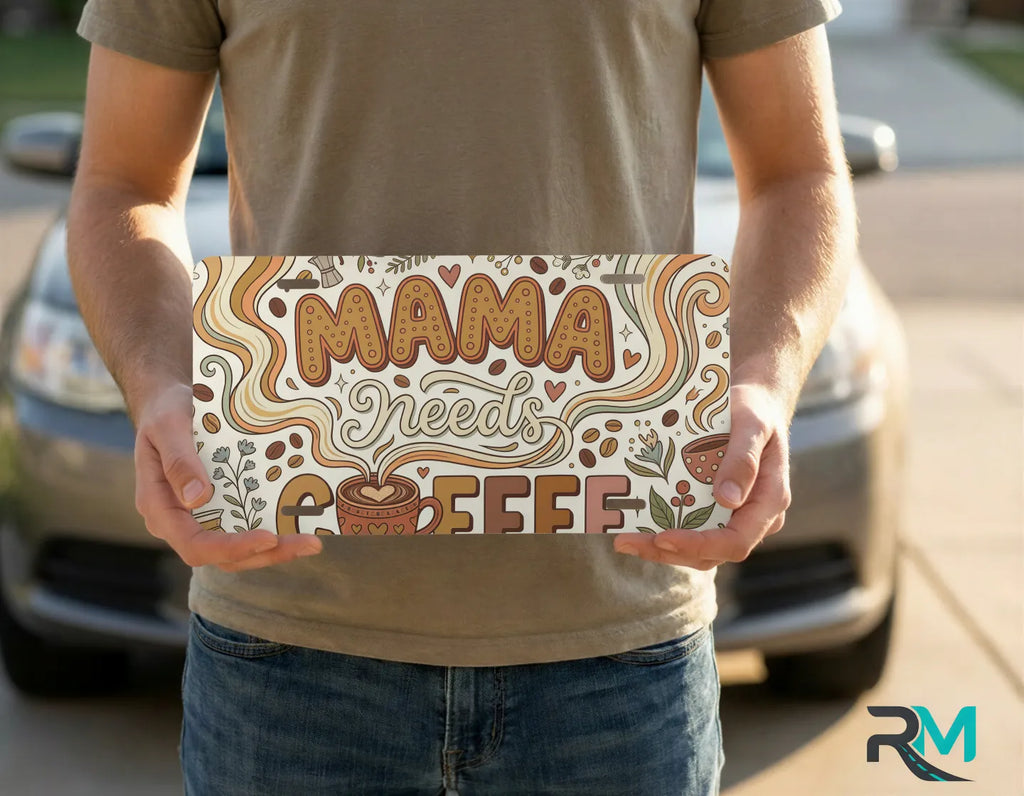 person holding mama needs coffee license plate — retro floral coffee vanity plate art