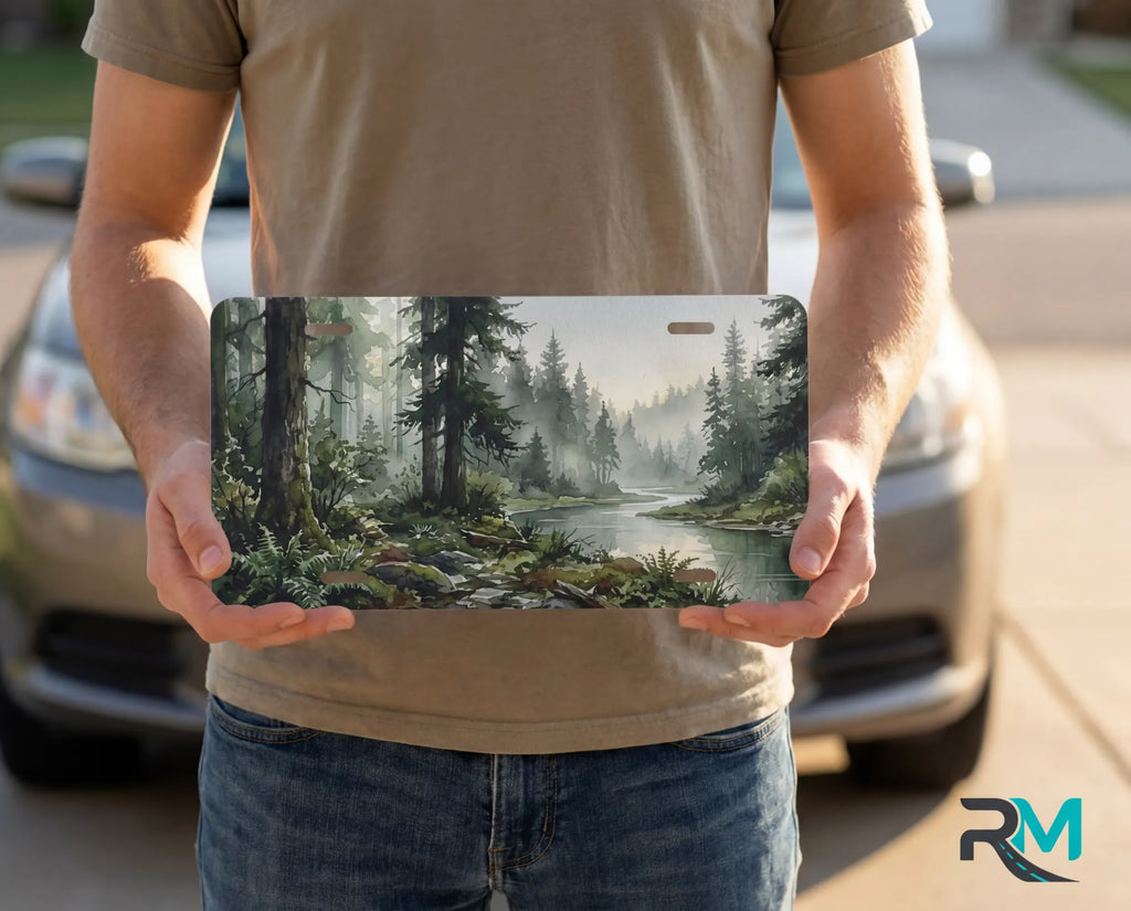 person holding misty forest river license plate — watercolor woodland vanity plate art