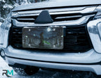 grim reaper vanity plate on car in snowy setting — deep blue reaper spectral green graveyard design
