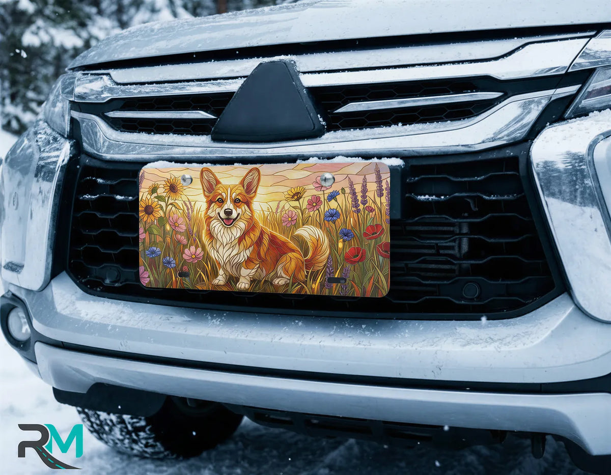 corgi wildflower vanity plate on car in snowy setting — soft gold pink corgi meadow design