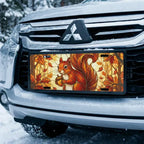 autumn squirrel vanity plate on car in snowy setting — warm amber squirrel acorn autumn design