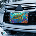 sea turtle vanity plate on car in snowy setting — vivid ocean blue coral reef design