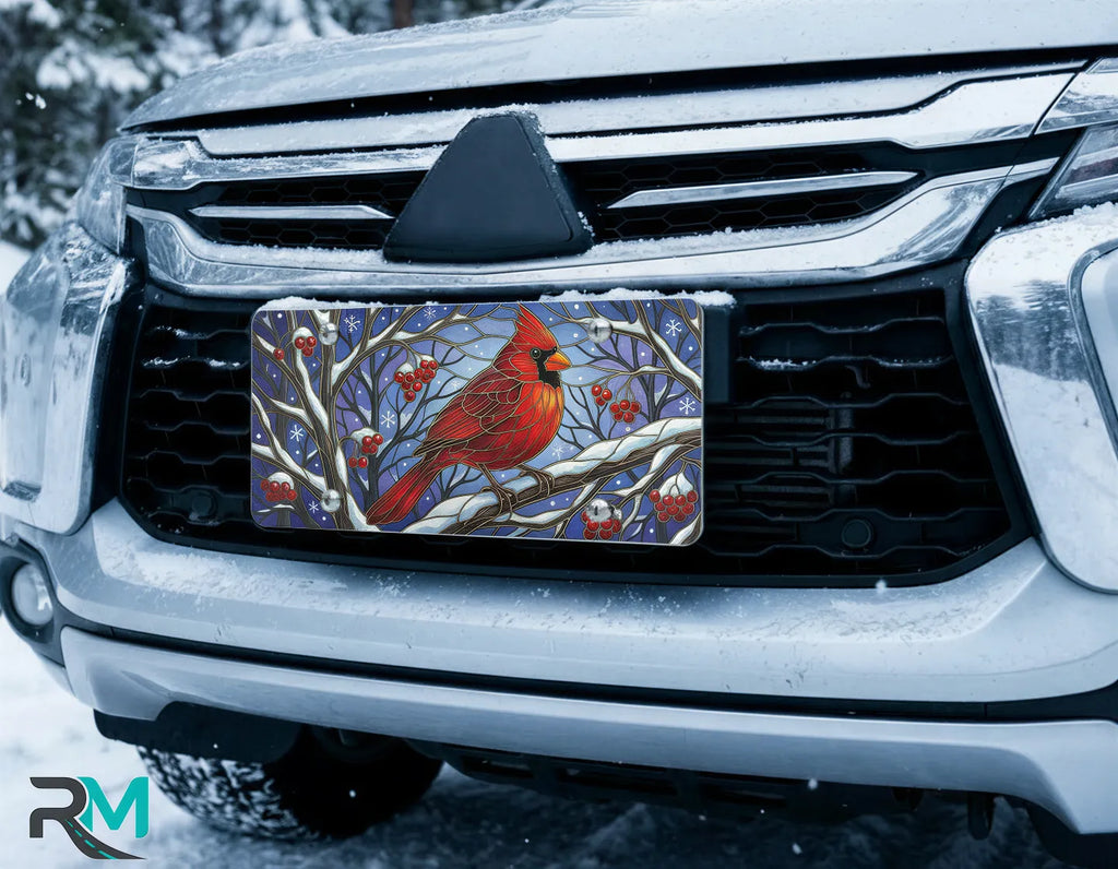 cardinal winter license plate on car in snowy setting — red bird snowy branch design