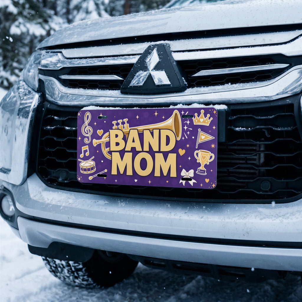 band mom license plate on car in snowy setting — musical notes marching band design