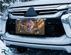 forest wizard vanity plate on car in snowy setting — deep purple gold wizard glowing magic ancient trees design
