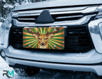 stag deer license plate on car in snowy setting — woodland amber green stag design