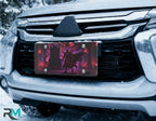 dark demon lord vanity plate on car in snowy setting — deep crimson violet demon lord throne design