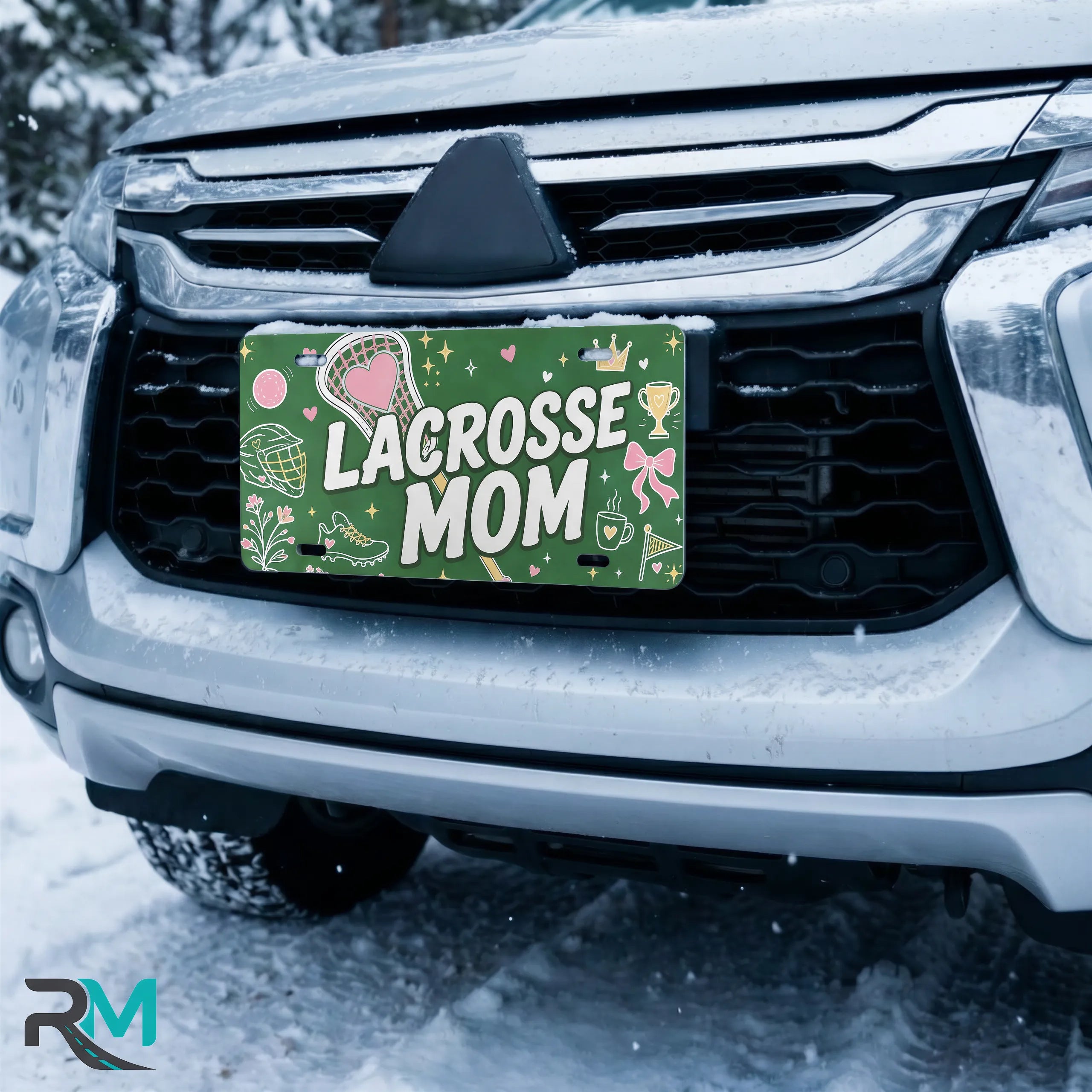lacrosse mom license plate on car in snowy setting — green pink lacrosse sports design