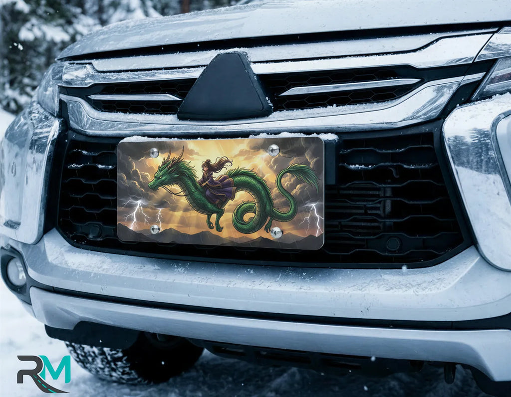 emerald dragon rider vanity plate on car in snowy setting — rich emerald dragon storm gold rider design