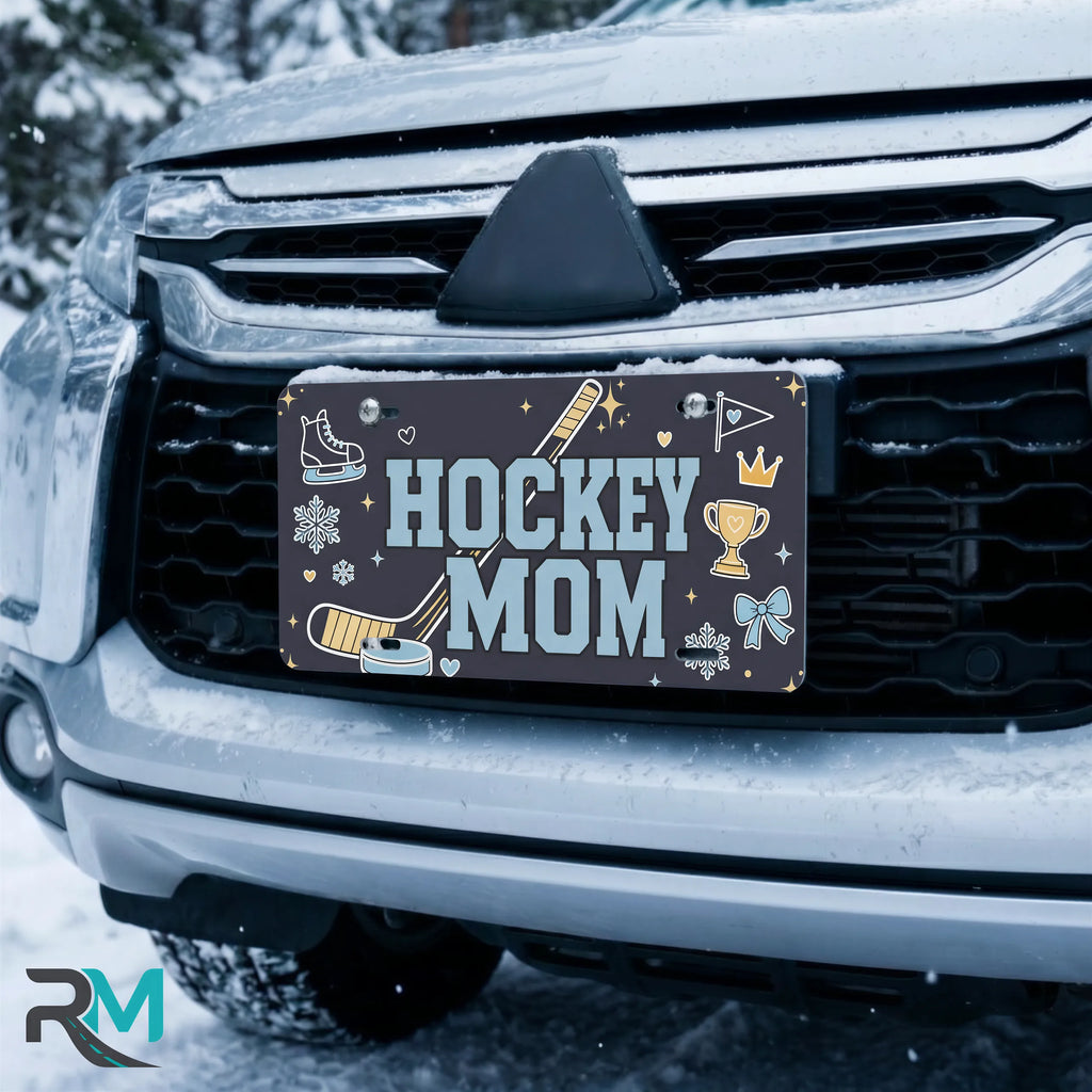 hockey mom license plate on car in snowy setting — navy hockey stick skate sports design
