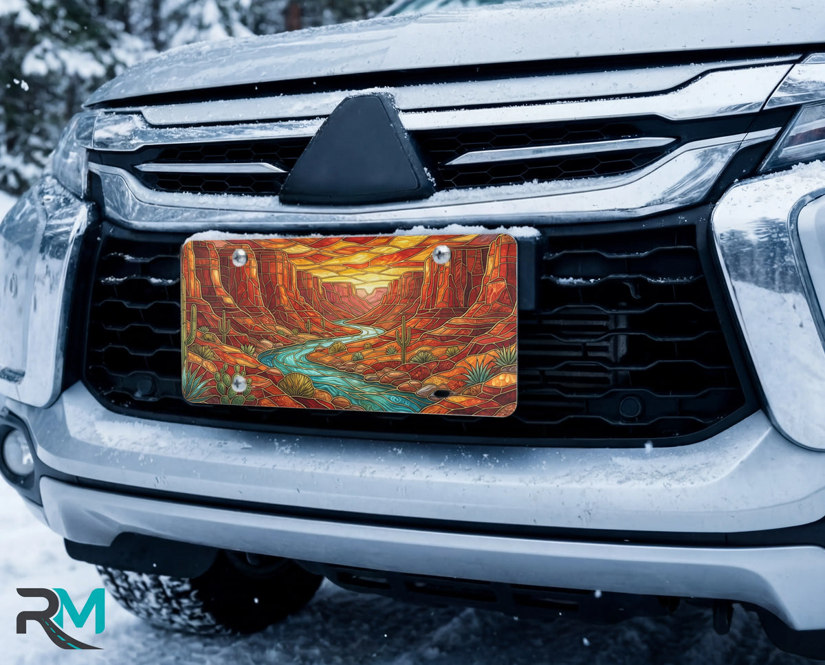 desert canyon river vanity plate on car in snowy setting — turquoise creek red rock canyon molten sunset design