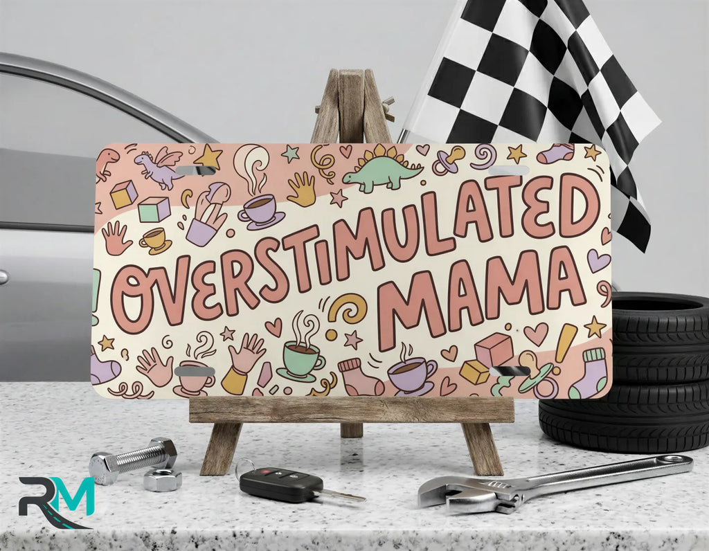 overstimulated mama collage vanity plate on display stand — pastel coffee blocks aluminum plate