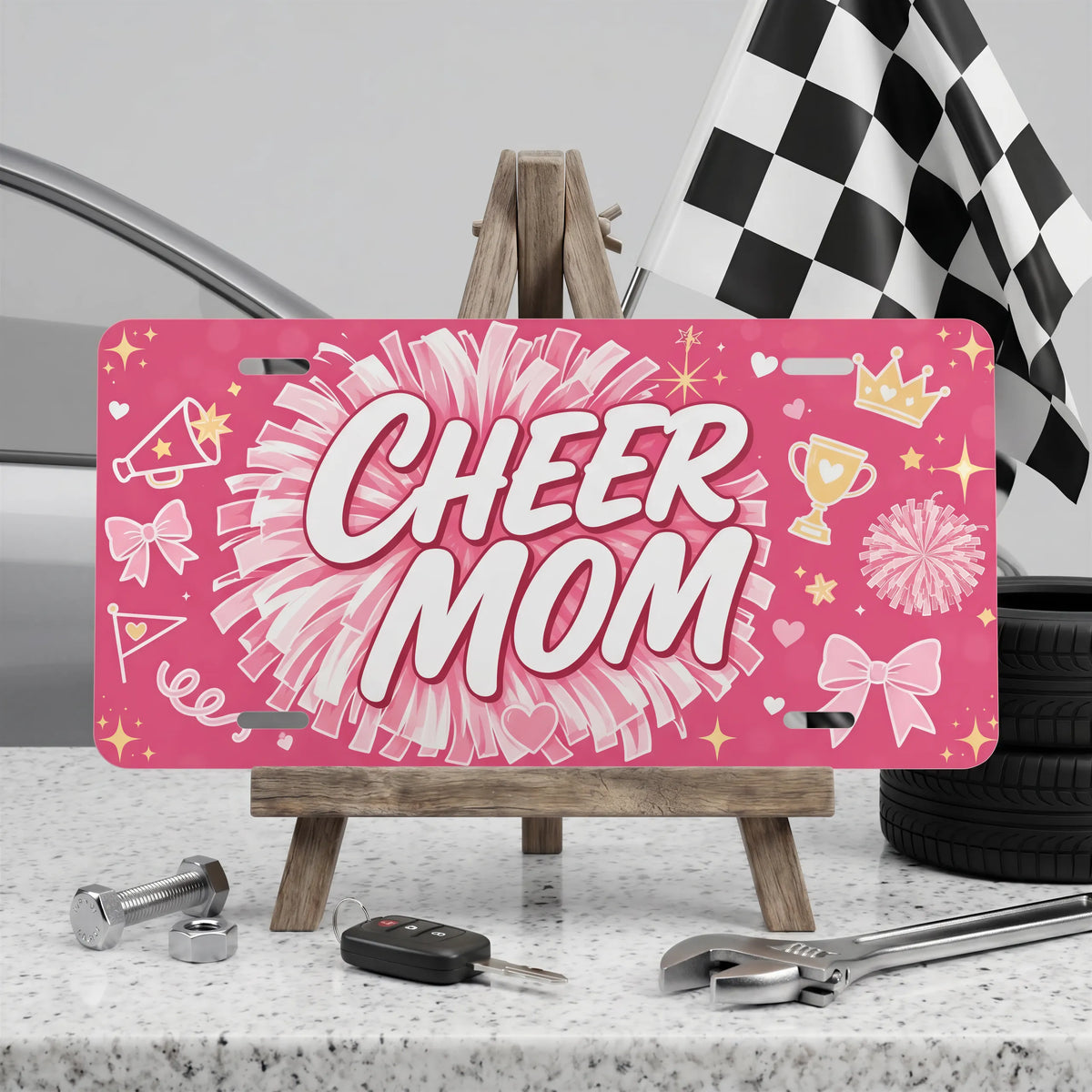 cheer mom vanity plate on display stand — hot pink pom-pom bow aluminum plate