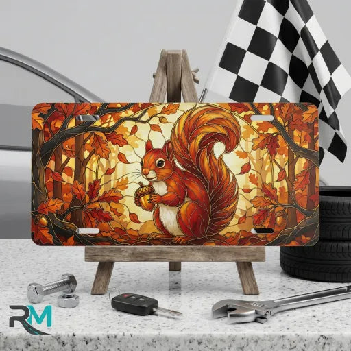 autumn squirrel vanity plate on display stand — warm amber squirrel acorn autumn aluminum plate