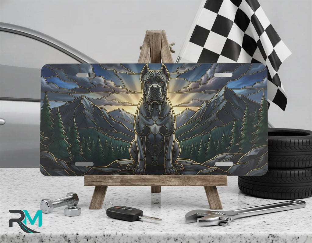 mountain mastiff vanity plate on display stand — warm amber sunrise guardian dog aluminum plate