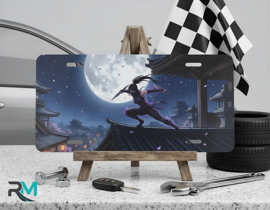 moonlit ninja vanity plate on display stand — glowing moon midnight ninja cherry blossoms aluminum plate