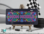 mom mobile vanity plate on display stand — neon pink blue yellow aluminum plate