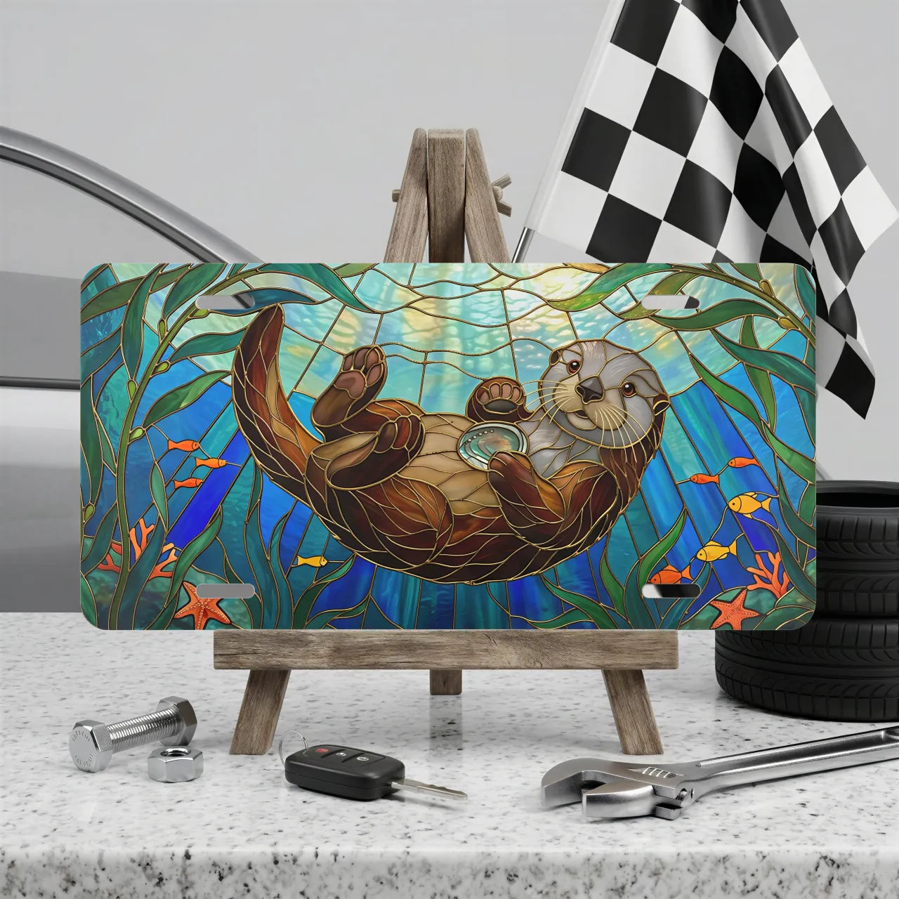 sea otter stained glass vanity plate on display stand — jewel teal otter kelp aluminum plate